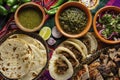 Traditional Mexican Feast: Tacos, Salsas, and Grilled Meats on Colorful Tablecloth