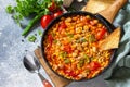 Chili con carne from meat, beans and vegetables on dark stone table. Copy space Royalty Free Stock Photo