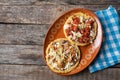 Mexican food: sopes of Chorizo and beef picadillo with cheese and beans Royalty Free Stock Photo