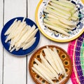 Mexican jicama and cucumber cutted on white background