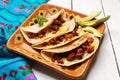 Mexican quesadillas with chorizo on white background Royalty Free Stock Photo