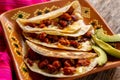 Mexican quesadillas with chorizo on wooden background Royalty Free Stock Photo