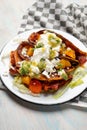 Mexican red enchiladas with potato and pork chorizo also called Potosinas on wooden background Royalty Free Stock Photo
