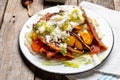 Mexican red enchiladas with potato and pork chorizo also called Potosinas on wooden background Royalty Free Stock Photo