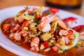 Traditional Mexican seafood. Aguachile, Mexican seafood food with copy space. Mexican seafood on wooden table.