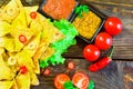 Nachos top view with Tortilla chips tomato salsa and mustard on rustic wooden background. A textured background.Copy paste place Royalty Free Stock Photo