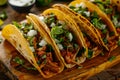 Traditional Mexican tacos with meat and vegetables on wooden desk Royalty Free Stock Photo