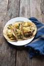 Mexican tacos of poblano rajas with potatoes and sour cream on wooden background Royalty Free Stock Photo