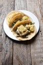 Mexican tacos of poblano rajas with potatoes and sour cream on wooden background Royalty Free Stock Photo