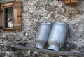 Traditional milk cans from the alps Royalty Free Stock Photo