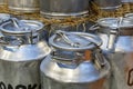 Traditional Milk Cans in front of a farm Royalty Free Stock Photo