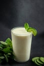 Traditional milk drink. Lassi, yogurt, ayran, kefir on a dark background, vertical image. top view. place for text