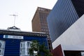 Traditional and modern buildings at the city. Blue house in front of modern offices buildings. Perth, Australia