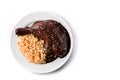 Traditional mole Poblano with rice in plate isolated on white background