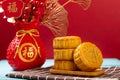 traditional moon cake with decorative vase horizontal composition the Chinese on the mooncake means five kernels and the ones on Royalty Free Stock Photo