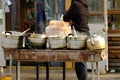 Traditional morning street food in China, using coal fire for heating soup. Perfect breakfast in winter Royalty Free Stock Photo