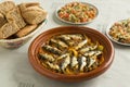 Traditional Moroccan dish with sardines and vegetables