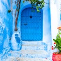 Traditional moroccan door in blue town Chefchaouen, Morocco Royalty Free Stock Photo