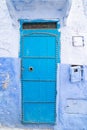 Traditional Moroccan door with canopy in Chefchaouen, the Blue Pearl Morocco Royalty Free Stock Photo