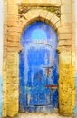 Traditional Moroccan blue door in medina Essaouria