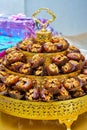 Traditional Moroccan stuffed dates with Dulce de leche and almonds served with milk. Royalty Free Stock Photo