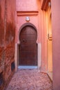 Traditional Moroccan style design of an ancient wooden entry door. In the old Medina in Marrakech, Morocco. Typical, old Royalty Free Stock Photo