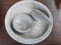 Traditional Mortar and Pestle made of stone which is usually made for grinding spices