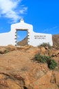 Traditional municipality sign white arch gate near Betancuria village with desert landscape in the background, Fuerteventura, Royalty Free Stock Photo