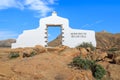 Traditional municipality sign white arch gate near Betancuria village with desert landscape in the background, Fuerteventura, Royalty Free Stock Photo