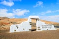 Traditional municipality sign white arch gate near Betancuria village with desert landscape in the background, Fuerteventura, Royalty Free Stock Photo