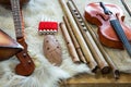 Traditional musical instruments made of wood flute and pipe close up