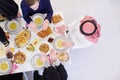 Traditional muslim family praying before iftar dinner top view Royalty Free Stock Photo