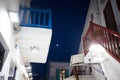 traditional narrow street in Mykonos with blue doors and white walls Royalty Free Stock Photo