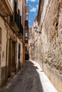 Narrow street in the old town of Palma de Mallorca, Spain Royalty Free Stock Photo