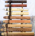 Traditional Native American Indian flutes on display for sale at a powwow, San Francisco Royalty Free Stock Photo