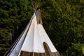 Traditional Native Tipi tent in forest Royalty Free Stock Photo