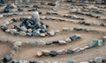 Traditional natural stone labyrinth maze made for contemplation and worship, created with rocks in shades of blue and turquoise