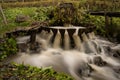 Traditional natural wash machine valtoare under a stream of water in Alba , Romania Royalty Free Stock Photo