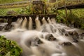Traditional natural wash machine valtoare under a stream of water in Alba , Romania Royalty Free Stock Photo