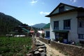 Traditional nepali houses and walking narrow street in Junbesi sherpa village