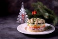 Traditional New Year`s Russian salad `Mushroom Glade` from boiled potatoes, carrots, eggs, smoked meat, soft cheese and marinated Royalty Free Stock Photo