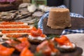 Traditional Norwegian cuisine - Brunost and fish Royalty Free Stock Photo