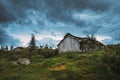 Traditional Norwegian Old Wooden Houses With Growing Grass On Roof. Cabins In Norway Royalty Free Stock Photo