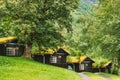 Traditional Norwegian Old Wooden Houses With Growing Grass On Roof. Cabins In Norway Royalty Free Stock Photo