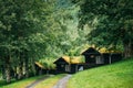 Traditional Norwegian Old Wooden Houses With Growing Grass On Roof. Cabins In Norway Royalty Free Stock Photo