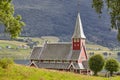 Traditional norwegian red stave church. Rodven. Travel Norway.
