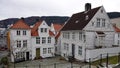 White wooden houses of Steinkjellerbakken in Bergen city in Norway Royalty Free Stock Photo