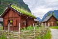 Traditional Norwegian wooden houses with grass on the roof  in Norway Royalty Free Stock Photo