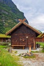 Traditional Norwegian wooden houses with grass on the roof  in Norway Royalty Free Stock Photo