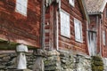 Traditional norwegian wooden red colored cabin houses facades. O Royalty Free Stock Photo